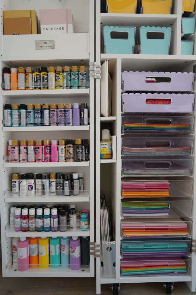 Paint and paper in a craft storage cabinet