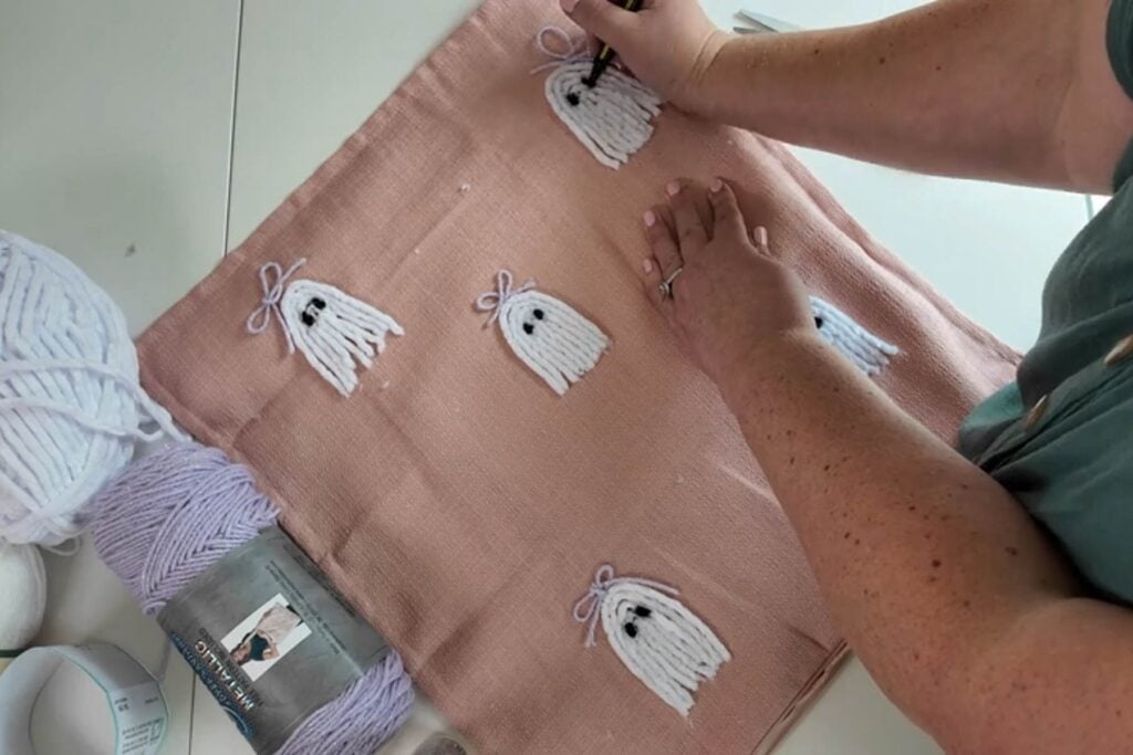 adding eyes to yarn ghosts