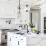 all white kitchen with marble accents