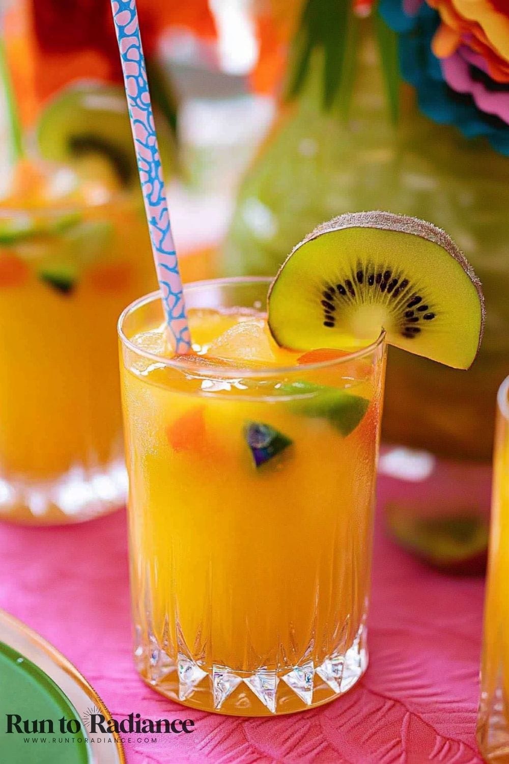 jungle juice in cup with printed straw