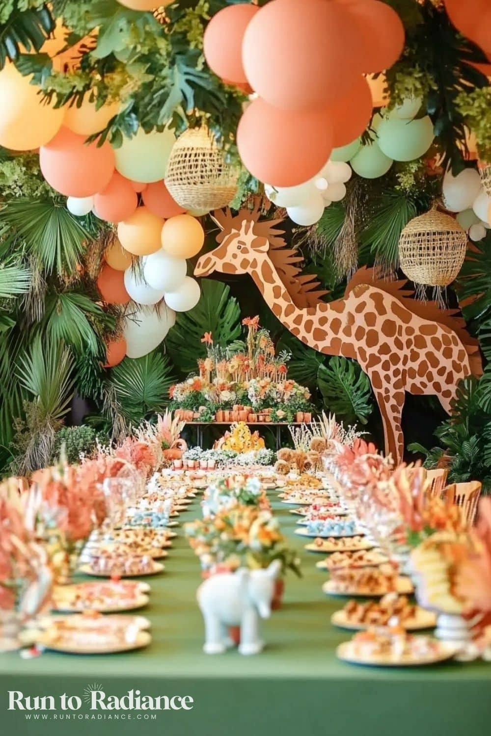 giraffe, palm leaves, and balloons as party animal birthday decorations