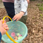 toddler with an easter basket
