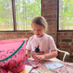 girl opening easter finds
