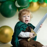 toddler with foam play sword