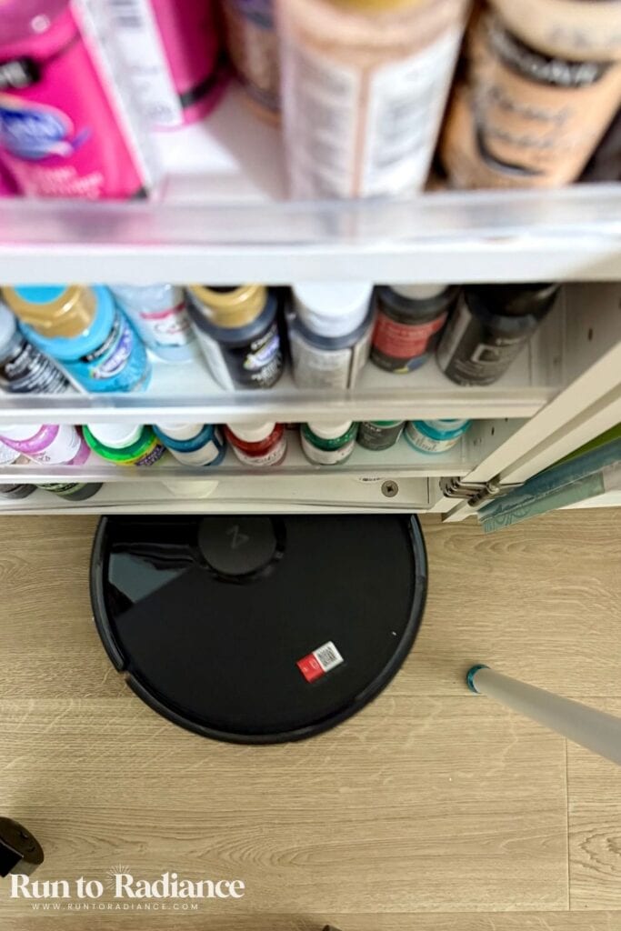 Roborock Q7 L5 robot vacuum running in straight cleaning lines on hard floors.