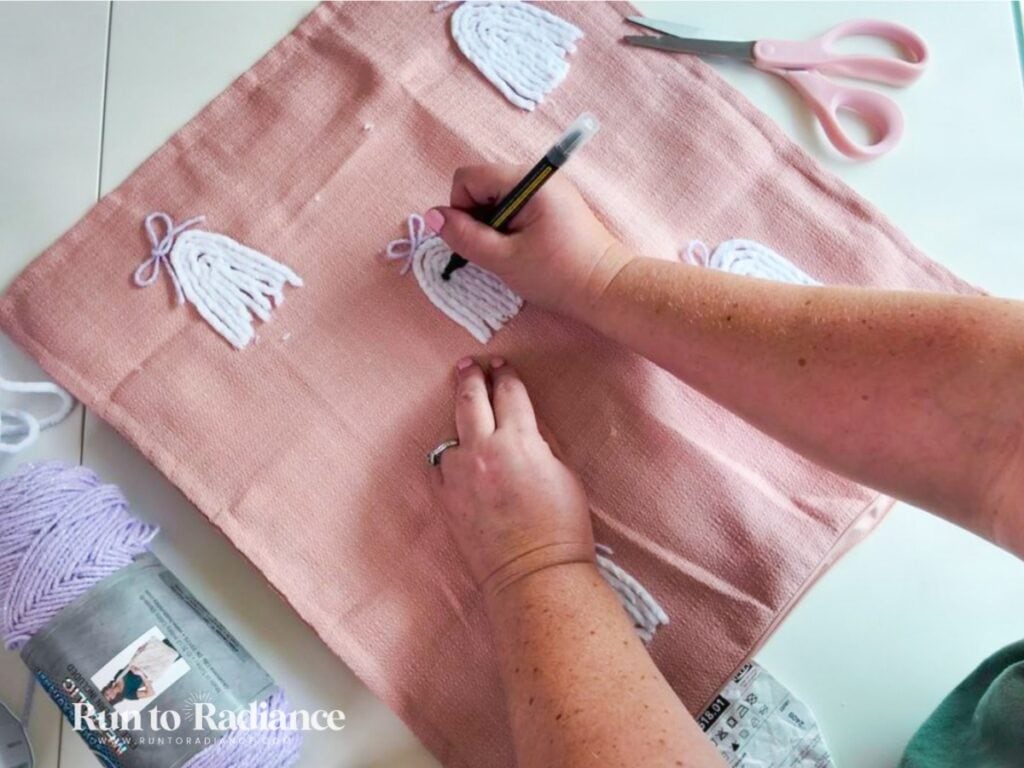 adding eyes to a diy ghost pillow