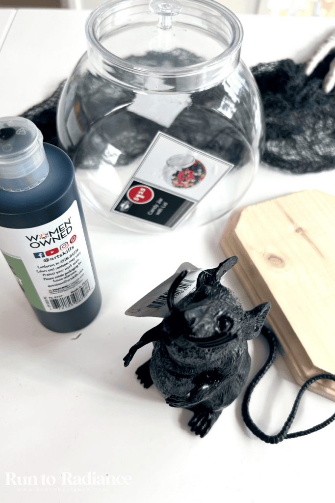 Toy rat and glass jar supplies for a dollar tree halloween specimen craft