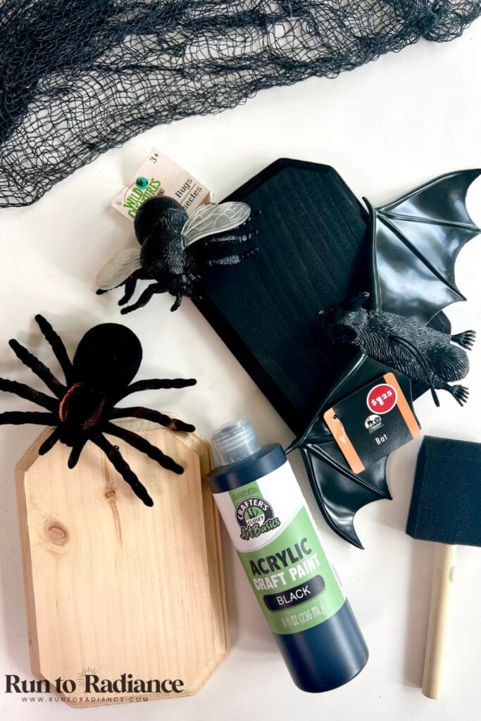 Wood plaque and toy bat supplies for a faux taxidermy halloween craft