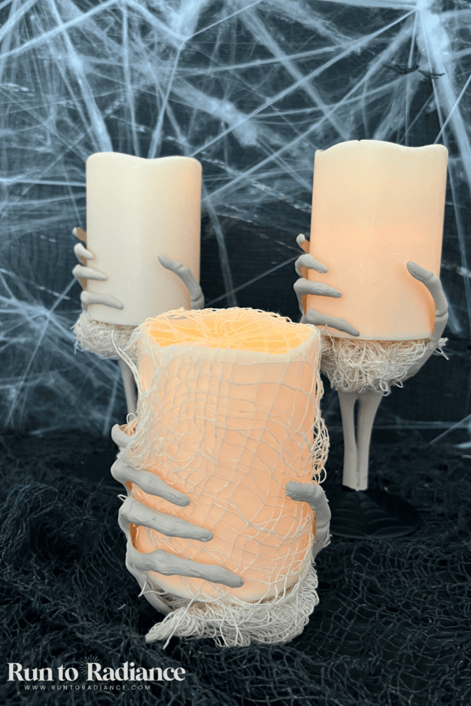 Trio of finished dollar tree skeleton hand candle holder