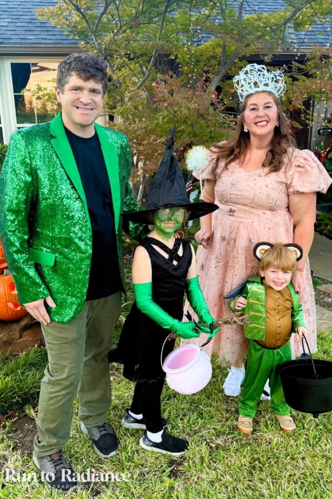Wicked family Halloween costume featuring Glinda, Elphaba, flying monkey, the wizard, and coordinating Oz inspired characters