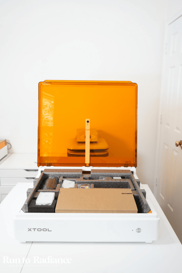 The xTool M2 Color Craft Laser sitting on a craft room table