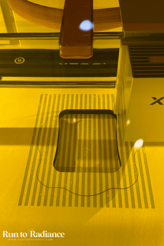 Close-up of the xTool M2 laser head during a project